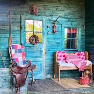 Wooden cabin accommodation with colourful interior design